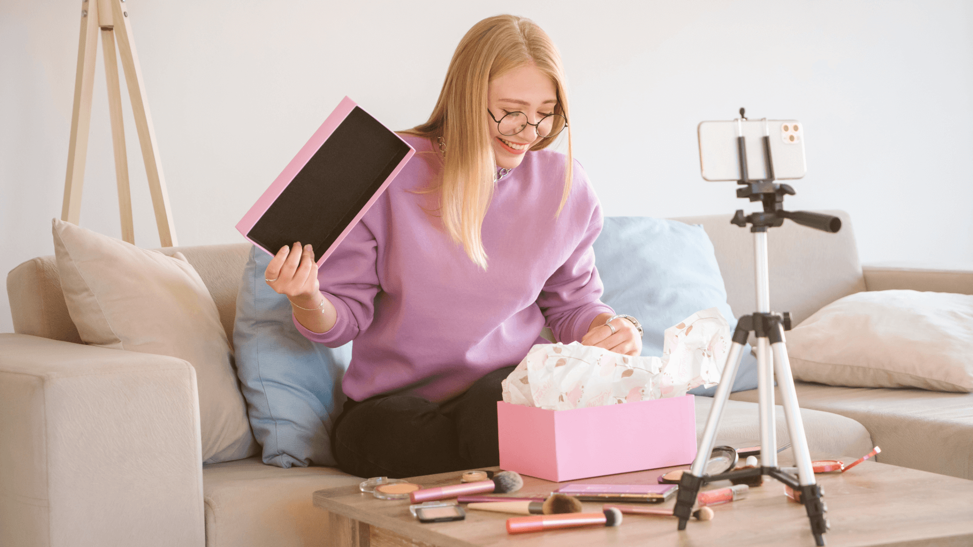 a lady making an unboxing video